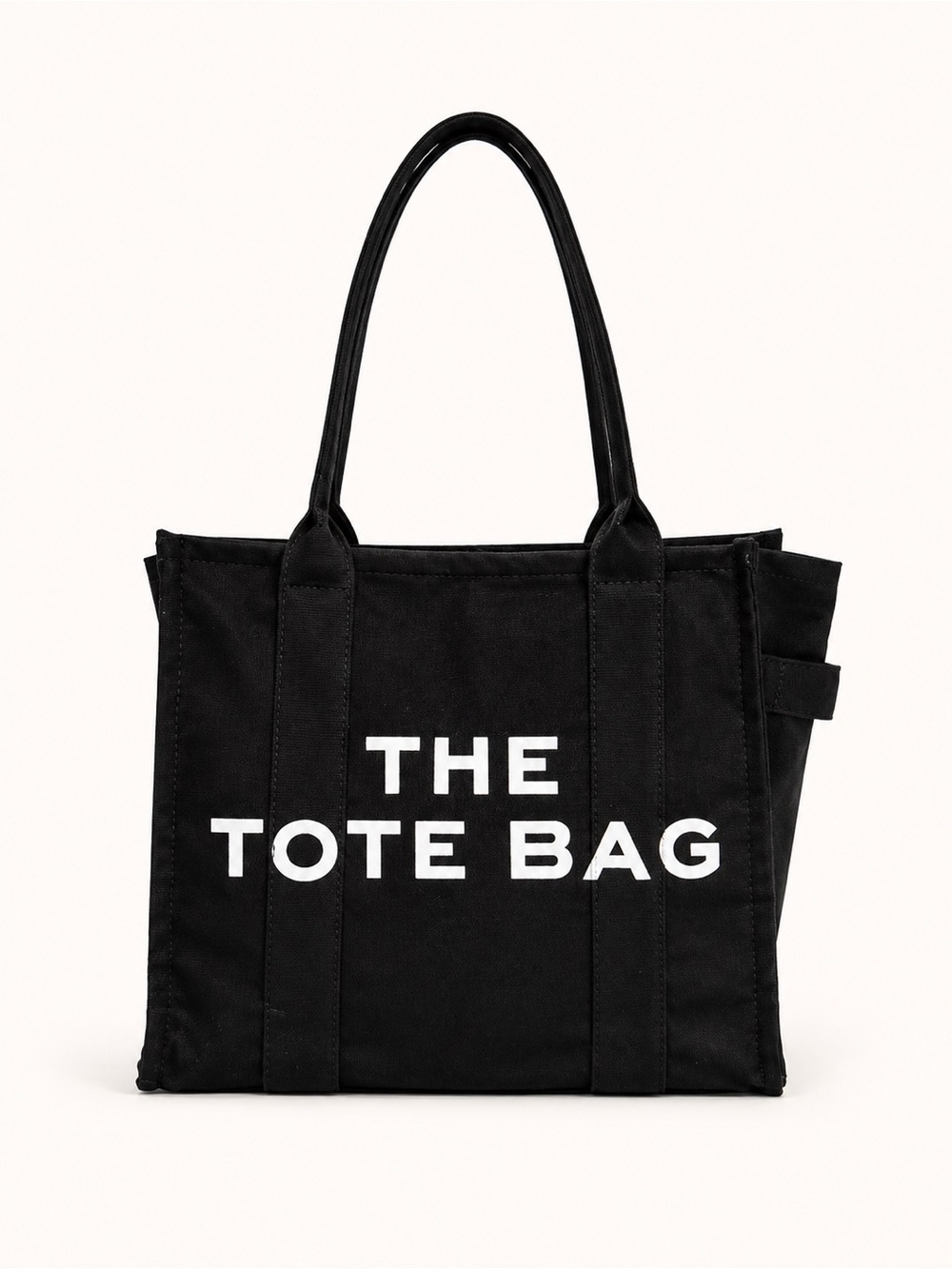 Black Canvas Tote Bag with White 'THE TOTE BAG' Logo